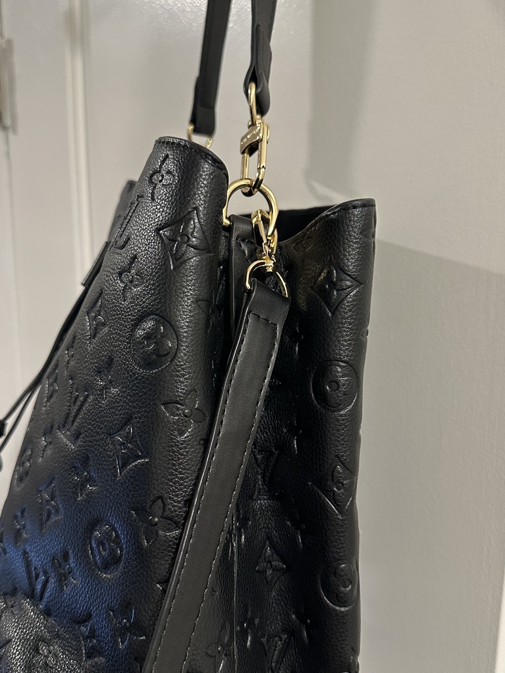 Black Leather Embossed Bucket Bag in Black with Gold Tone